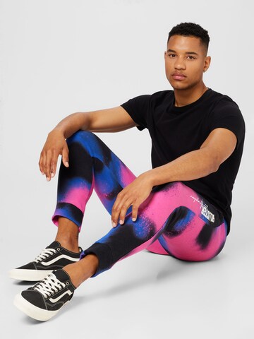 Effilé Pantalon HOLLISTER en mélange de couleurs