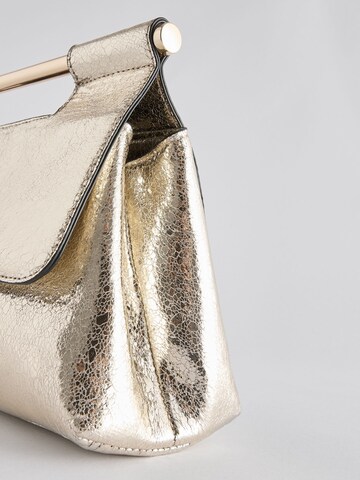 Pochette Next en or
