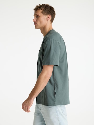 CHASIN' T-Shirt 'Motan' in Grün