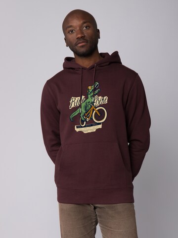 Sweat-shirt ' T-Rex Fahrrad ' Watapparel en rouge : devant