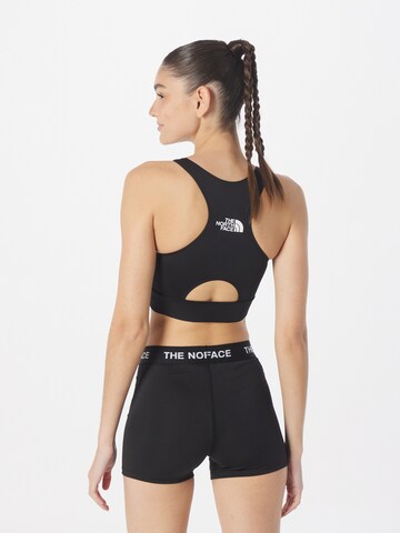 THE NORTH FACE Bustier Urheilurintaliivit 'FLEX' värissä musta