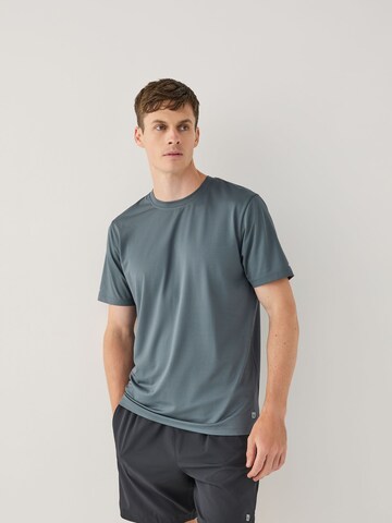 Next Koszulka funkcyjna w kolorze szary: przód