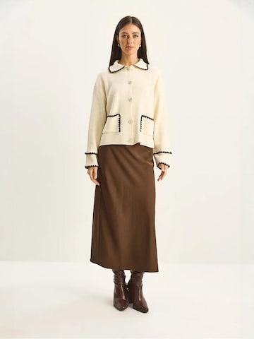 Cardigan Bianco Lucci en beige