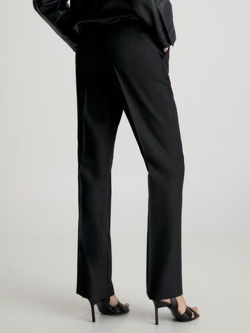 Coupe slim Pantalon à plis Calvin Klein en noir