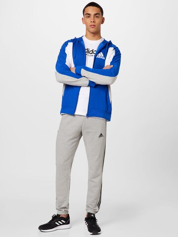 ADIDAS SPORTSWEAR Sportsweatjacke 'Essentials Colorblock ' in Blau