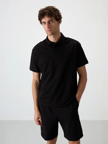 T-Shirt Tommy Life en noir : devant