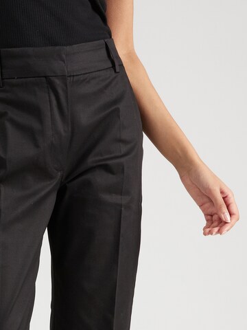 regular Pantaloni con piega frontale di TOMMY HILFIGER in nero