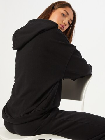 ABOUT YOU Limited Sweatshirt 'Mia' in Zwart