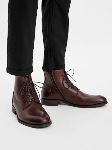 Bianco Lace-Up Boots in Brown