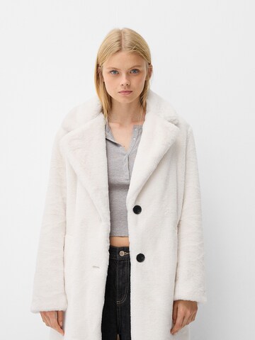 Bershka Between-Seasons Coat in Beige: front