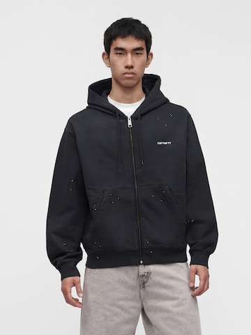 Veste de survêtement Carhartt WIP en noir : devant