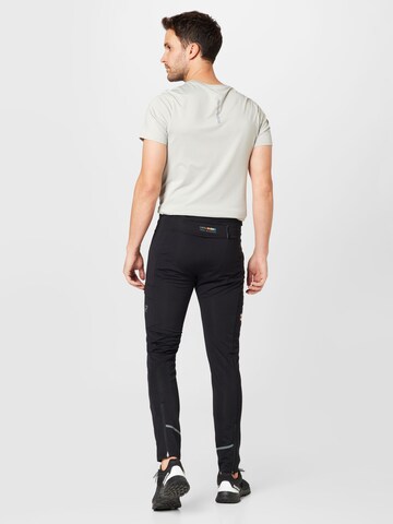 Skinny Pantaloni sportivi 'MUSSALO' di Rukka in nero