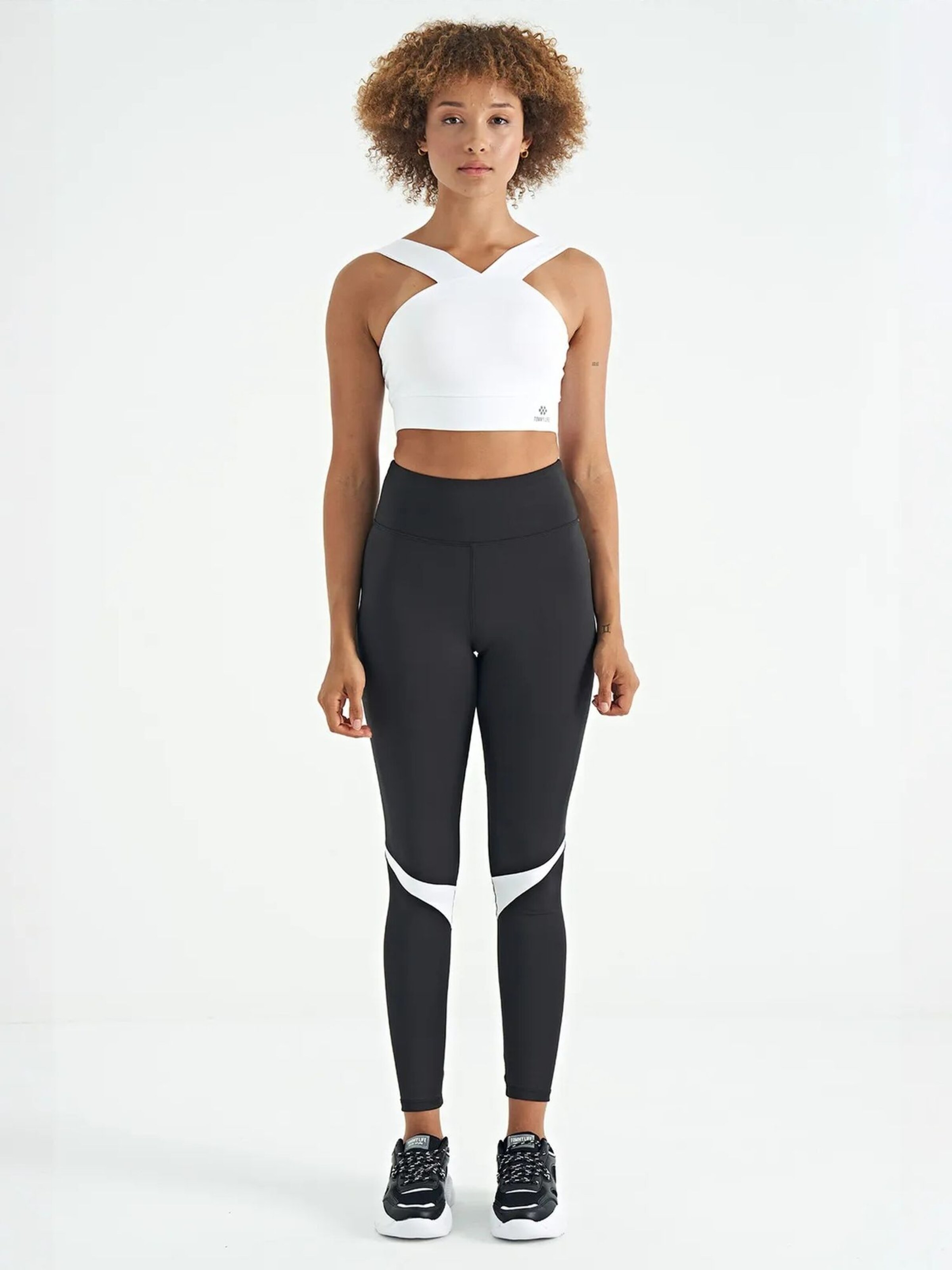 Top sportivo di Tommy Life in bianco