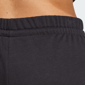 ADIDAS SPORTSWEAR Tapered Sports trousers 'Essentials' in Black