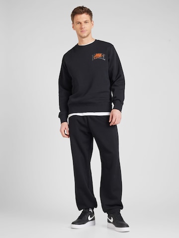 Nike Sportswear Bluzka sportowa 'CLUB BB ARCH GX' w kolorze czarny