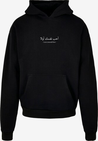 Sweat-shirt 'Love Yourself First' Merchcode en noir : devant