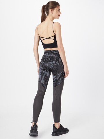 Skinny Pantalon de sport 'Fly Fast' UNDER ARMOUR en noir