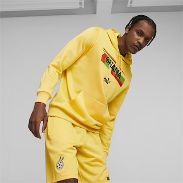 Sweat de sport 'Ghana' PUMA en jaune : devant