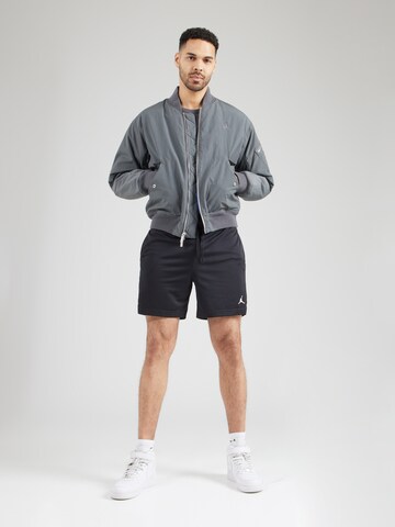 Regular Pantaloni sport de la Jordan pe negru
