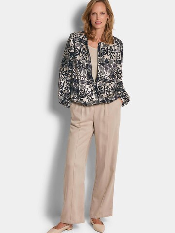 Goldner Tussenjas in Zwart