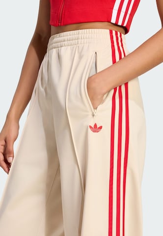 ADIDAS ORIGINALS - Loosefit Pantalón deportivo 'Firebird' en beige