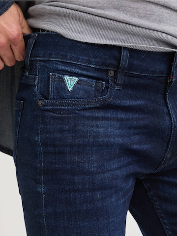 GUESS Slimfit Jeans 'Finnley' in Blau
