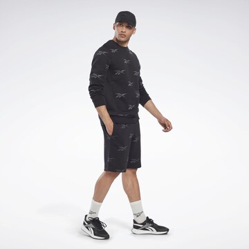 ReebokSportska sweater majica 'Identity Vector' - crna boja