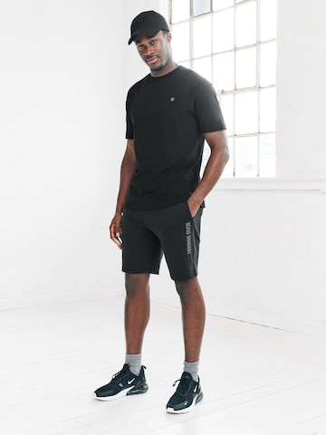 regular Pantaloni sportivi 'Active Training Division' di Next in nero