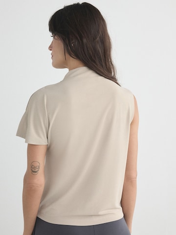 Maglietta di Next in beige