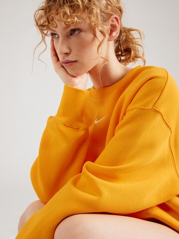 Nike Sportswear - Sudadera 'PHOENIX FLEECE' en naranja