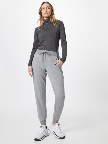 Effilé Pantalon de sport SKECHERS en gris