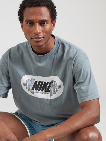 NIKE Functioneel shirt 'M90 GYM HERITAGE' in Grijs