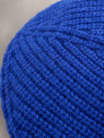 Bonnet Next en bleu