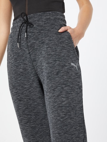 PUMA - Tapered Calças de desporto em cinzento