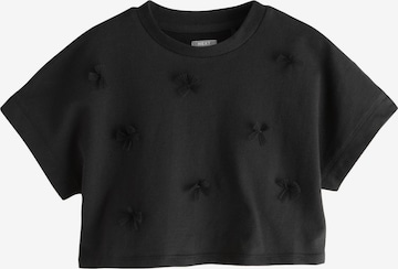 T-Shirt Next en noir : devant