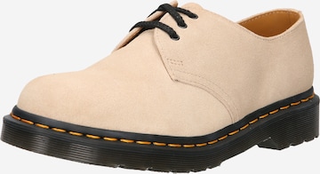 Chaussure à lacets Dr. Martens en beige : devant