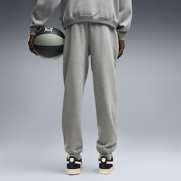 PUMA Regular Sports trousers in Grey