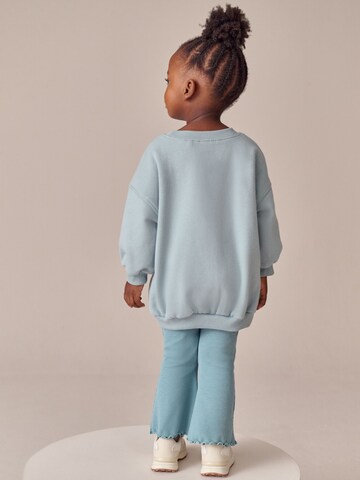 Set Next en bleu