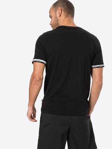 T-Shirt fonctionnel 'Amplified' PUMA en noir