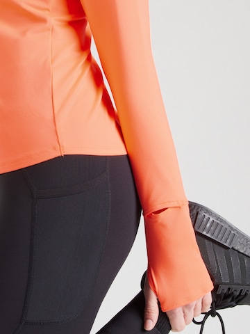 Maglia funzionale 'Qualifier Run' di UNDER ARMOUR in arancione