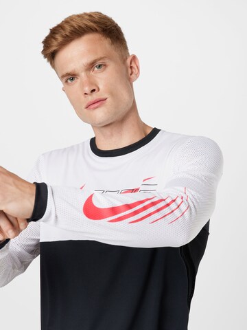 NIKE Sportshirt 'Clash' in Schwarz