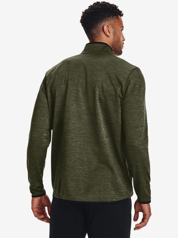 Maglia funzionale di UNDER ARMOUR in verde