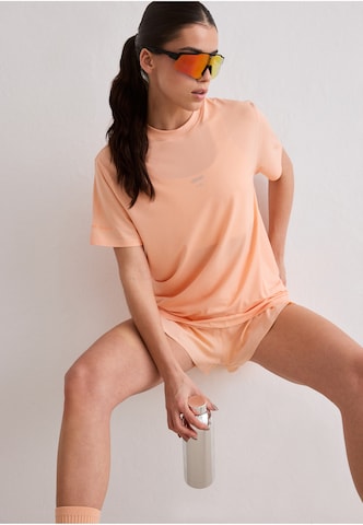 Aim'n Performance Shirt 'Le Run' in Orange