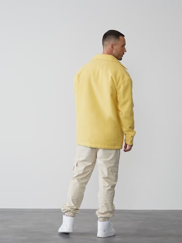 DAN FOX APPAREL Regular fit Between-Season Jacket 'Mick' in Yellow