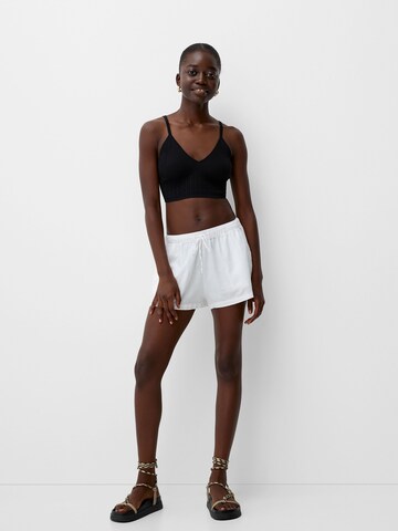 Bershka Top z naramnicami | črna barva