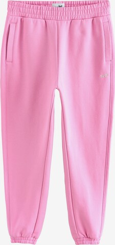 self. Weatherproof pants in Pink: front