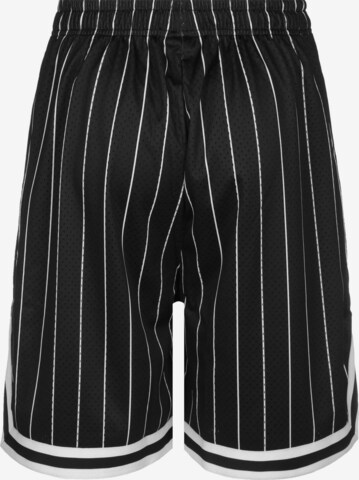 Karl Kani Loose fit Pants 'Varsity' in Black