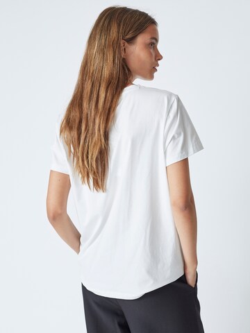 Haut co'couture en blanc