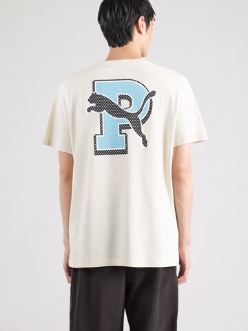PUMA - Camisa funcionais 'Graphic Varsity' em branco: frente