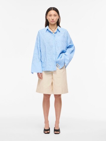 ROUGE EDIT Bluse i blå